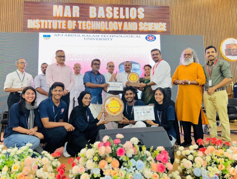 ICET students and faculty receiving the KTU University NSS Award on stage